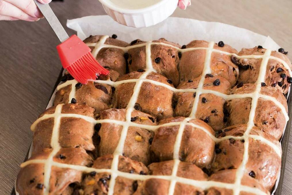 Follow these steps to make your own hot cross buns. Photo: Tamara West