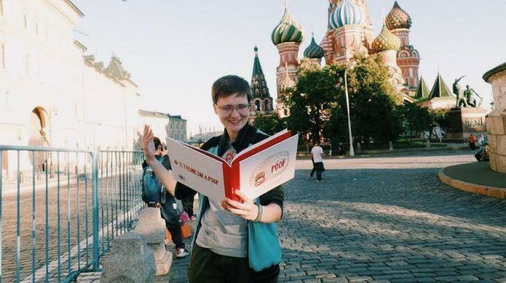 A russian LGBT activist reads I think I'm a poof in Moscow Photo: Supplied