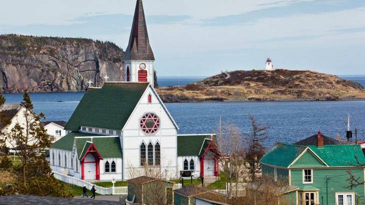 St. Paul's Anglican Church (foreground) and Fort Point Lightouse (background). Photo: Robert Chiasson