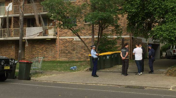 Police at one of the houses raided on Wednesday morning. Photo: Peter Rae