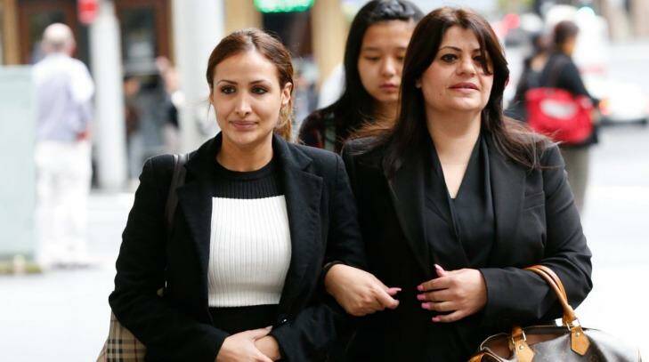 Rachelle Louise outside court on Monday with a sister of her partner Simon Gittany. 