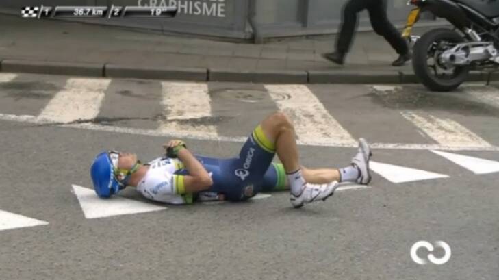 Crash, bang: Simon Gerrans lies on the road after his second accident in the Liege-Bastogne-Liege classic. Photo: Cycling Central
