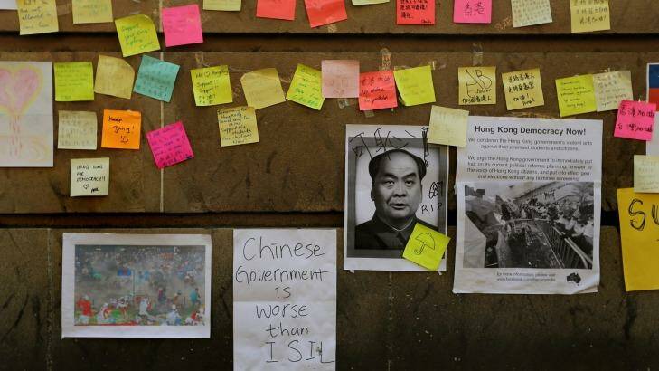 Messages of support for the Hong Kong protesters on the wall of Hong Kong House on Druitt Street in the Sydney CBD.  Photo: Kate Geraghty