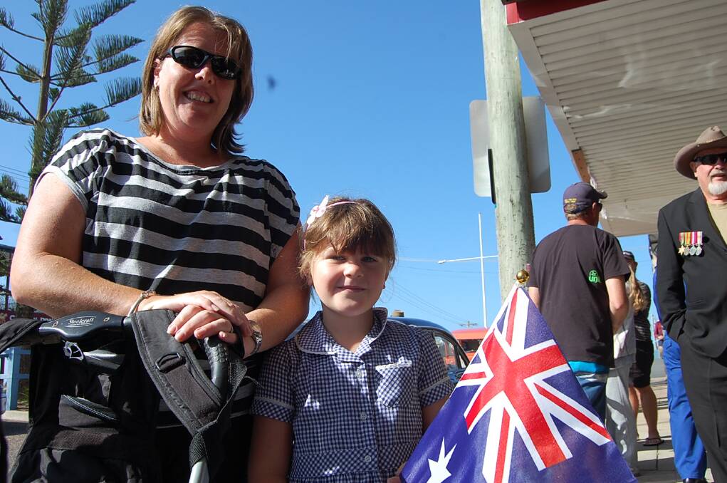 Young and old flew the Aussie flag on ANZAC Day 2014 in Eden.