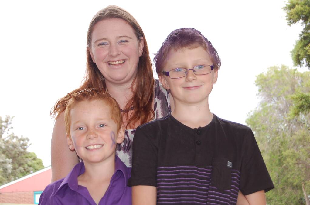 Kristin Vermazen organised Purple Day at Eden Public School, to help raise awareness for her son Jaidyn (left), while his brother Lochlainn went the extra mile by sporting purple hair for the occasion.