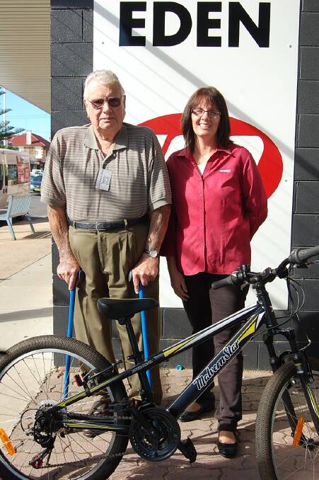Raffle winner Terry Elliott (left), with former Eden Public School P&C president Donna Gray, who is going to pass the bikes on to the school.