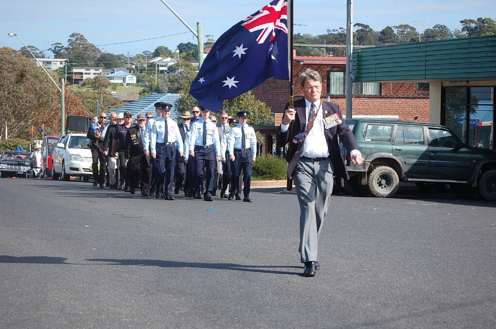 Richard Lamacraft leads the 2014 ANZAC Day march down Bass Street.