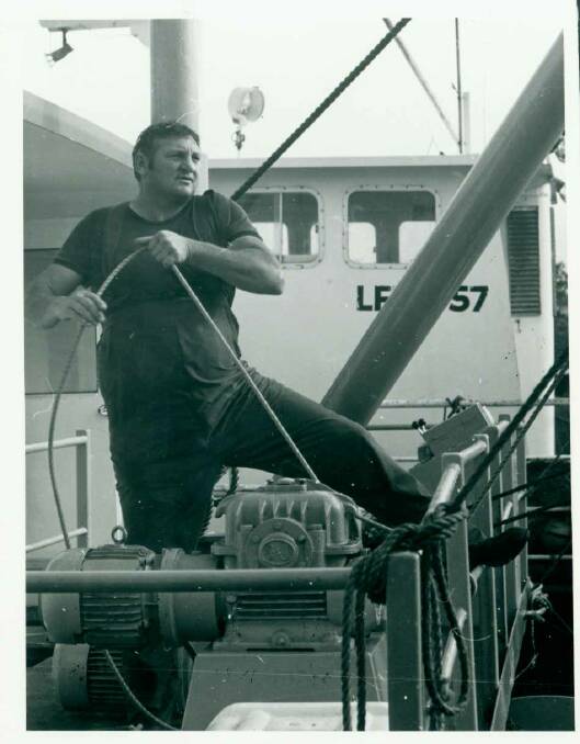 June 23, 1983: Norm Love, owner skipper of  the Twofold Bay, operating the winch during the unloading of the big gemfish catch.
