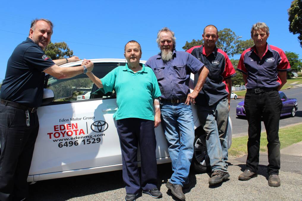 Eden Motor Group managing director Con Zurcas (left) has stepped in to provide transport for dialysis patient and Bupa Eden resident Ron Longford, allowing his son Wayne to return to full-time work. Eden Motor Group staff members Chris Goroch and Bob Preston (right) will alternate with Wayne to bring Ron home from his appointments in Bega three times per week, after Bupa and the Southern NSW Local Health District failed to provide transport for Mr Longford.
