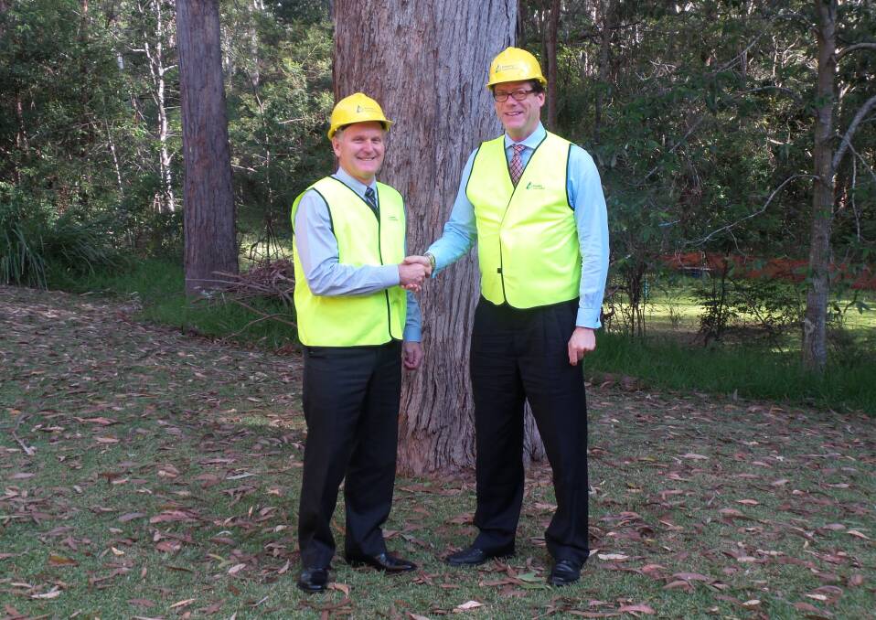 
Acting general manager of WorkCover NSW's Work Health and Safety Division, Peter Dunphy (left), and Forestry Corporation of NSW CEO Nick Roberts at the safety partnership renewal ceremony.