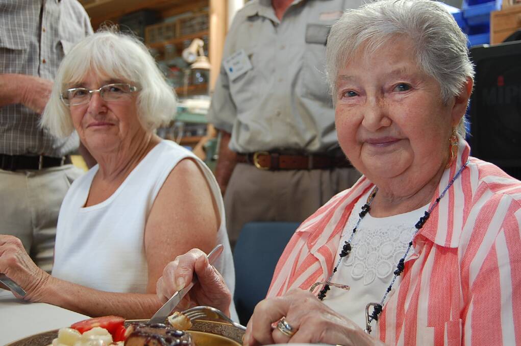 Valda Patts (left) and Ellen Chamberlain tuck into their “Paddies plus one” lunch.