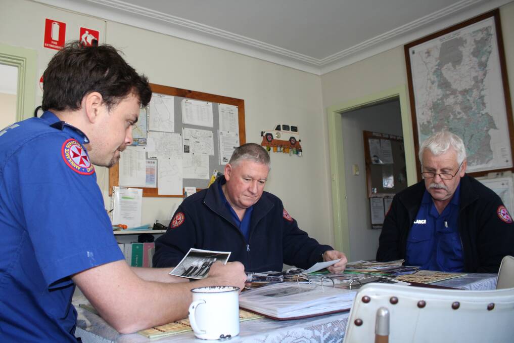 Eden ambulance officers Yestyn Bawden, Steve Marks and Barry Hall sorting through 50 years of Eden Ambulance Station history, ahead of Saturday afternoon's Golden Jubilee celebrations.
