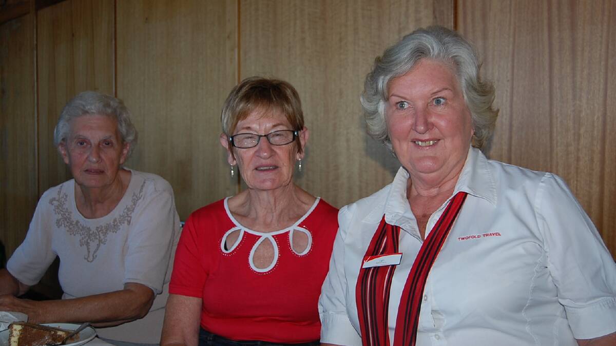 Val Hemmingfield (left) and Marie Slater got some travel tips from Twofold Travel’s Lyn Kennedy (right).