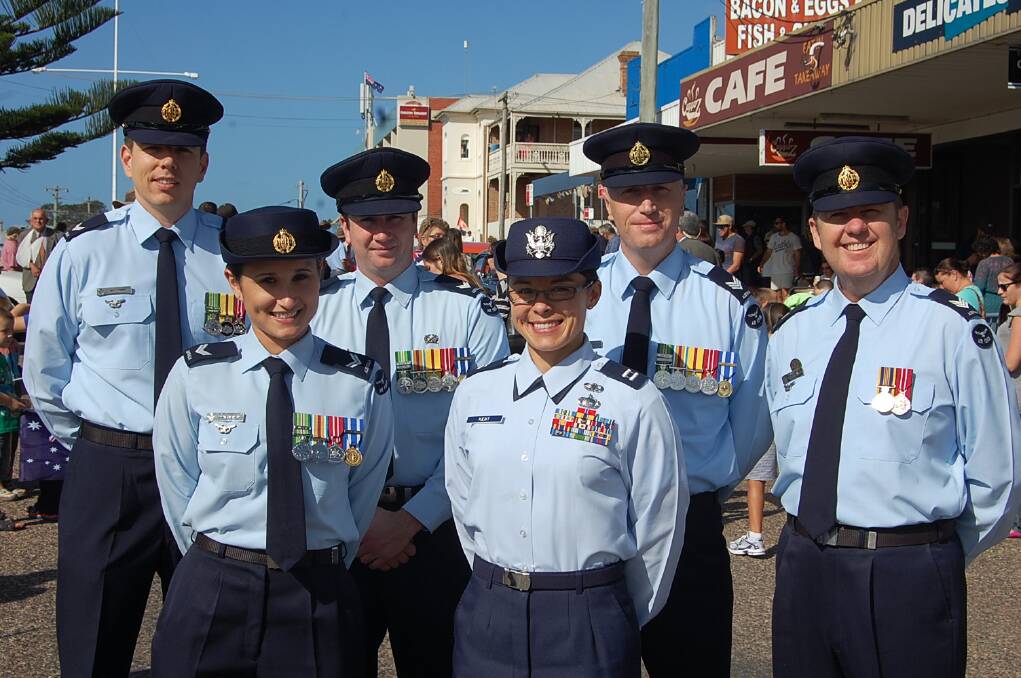 The catafalque party was comprised of 460 Squadron (Defence Imagery) members (back, from left) Michael O'Brien, Michael Kimmorley, Matthew Shepley and Steve Knowles, and (front, from left) Kate Devenish and Tina Kent.