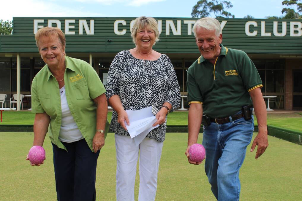 Eden Ladies Bowls Club president Marcelle Cavanough (centre) presents Can Assist volunteers Rhonda and Peter Van Bracht with a $1140 cheque following the club’s recent charity bowls day.