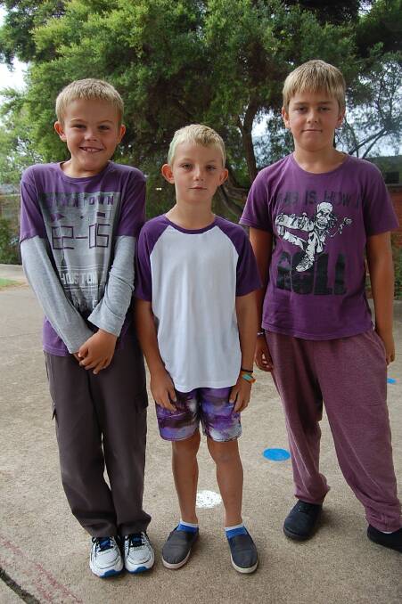 Purple Day was a hit with (from left) Jayden Rogers, Jack Young and Riley Stevensons at Eden Public School on Wednesday.
