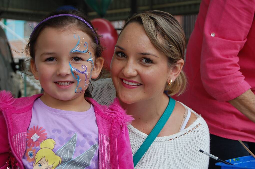 Zofia Symonds and her mum Tully tried their hand at face painting at the Eden Public School fete on Wednesday.