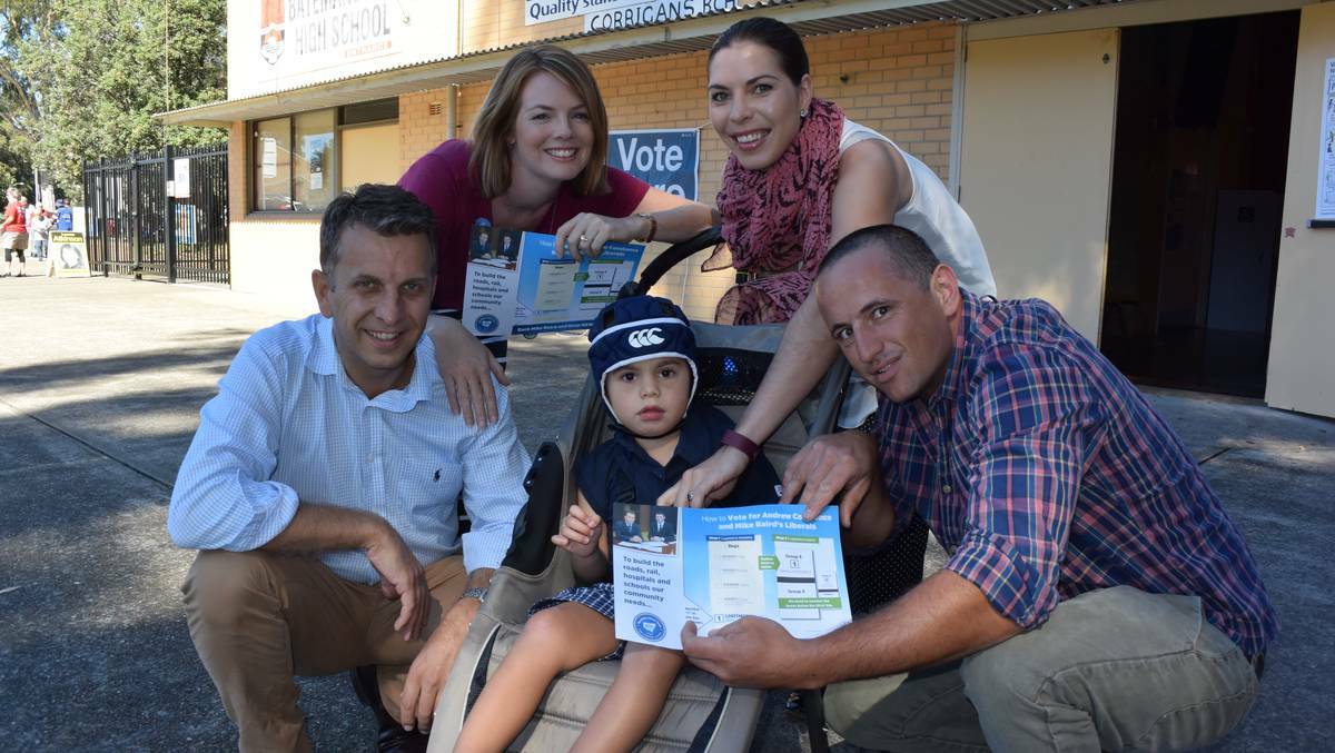 At Batemans Bay High School on election day are Liberal candidate Andrew Constance, Jenny Clarke and Muddy Puddles children's disability advocates Frankie, Sally and Nick Minato.