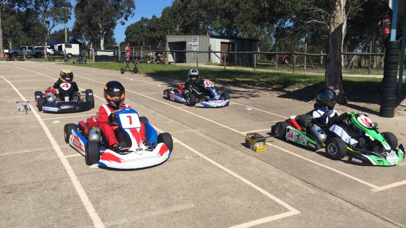 • Four eager young drivers take the starting grid for a meet at the Sapphire Coast Kart Club on Saturday. 