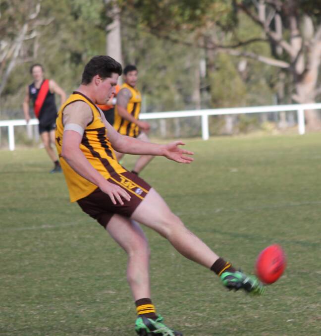 • Panther Dylan Cook kicks to a team-mate before a match against the Bega Bombers had to be called off recently. 