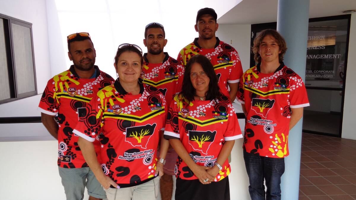 • Members of the Indigenous dream team and sponsors from Wandarma celebrating the arrival of this year’s special jerseys are (back, from left) Steven Luff, Dillon Aldirdge, Joe Alrdidge, Jake Frances (front) Wandarma program manager Rachel Wallace and administration officer Jo Norton-Baker. 