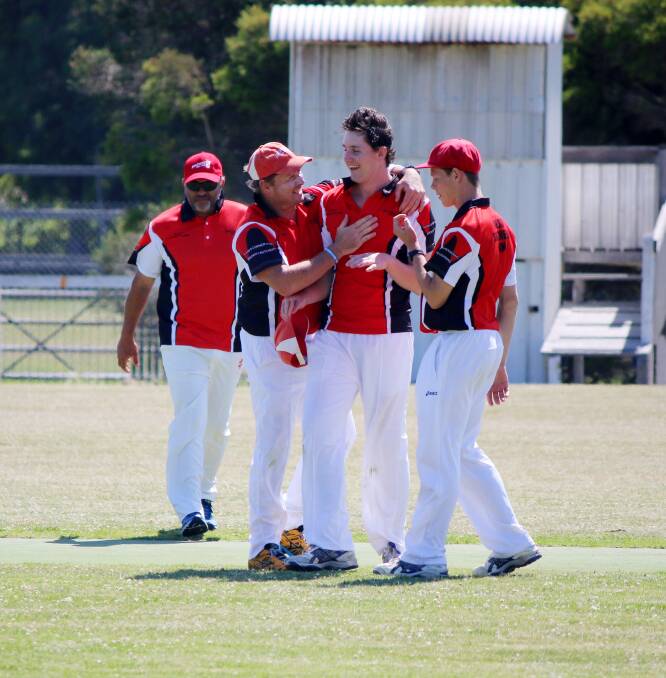 • Drew Mudaliar (left), Mark and Corey Spink rush in to congratulate Reece Wheeler after knocking Bega-Angledale down to its final wicket on Saturday. 