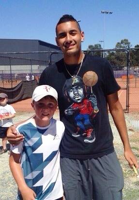 • Merimbula junior tennis star Logan Staight (left) catches up with world number 52 Nick Kyrgios during Australian Open trials in Canberra recently.