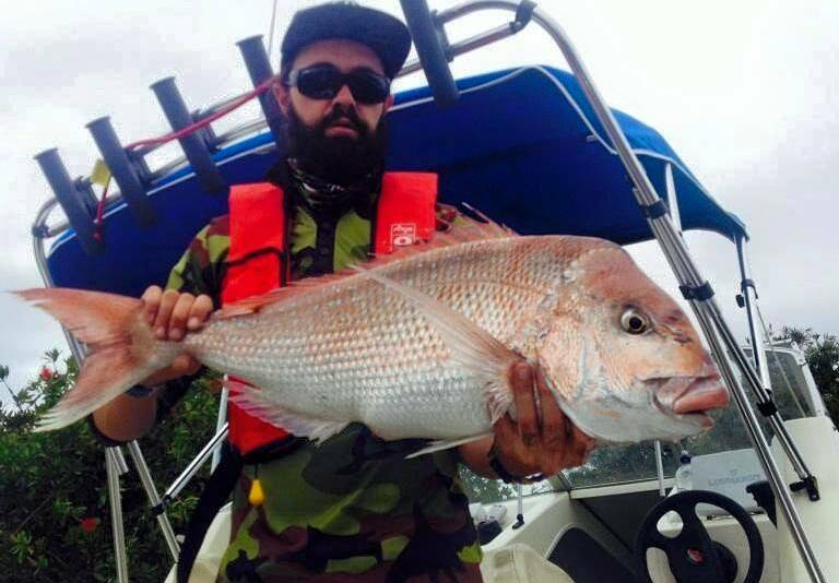 • Angler Joel Fletcher shows off a magnificent  8.22kg snapper he caught off Merimbula. 