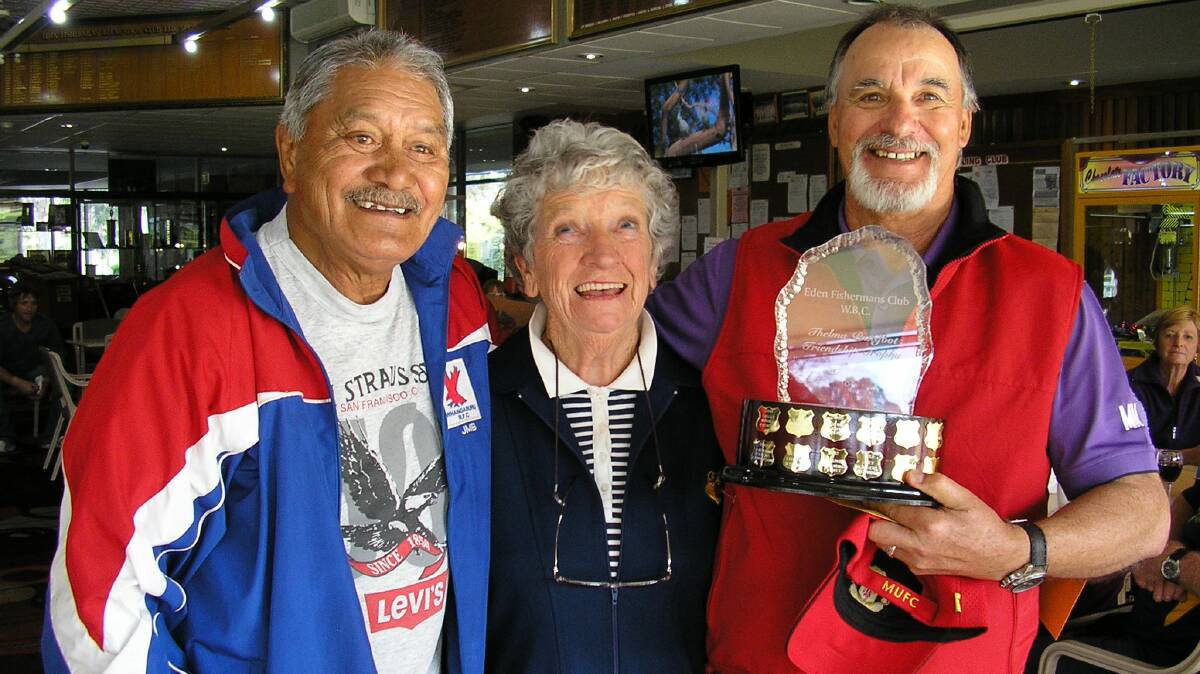 • Proudly showing off  the Thelma Puttifoot Frienship Day shield are (from left) Bob Heteraka, Joan Swires and Manuel Marques. 