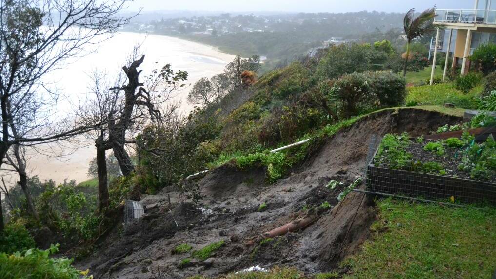 LANDSLIDE:A backyard in Mitchell Parade slipped away on Tuesday afternoon after 24 hours of relentless rain. Photo: FREDDIE SIMON. 