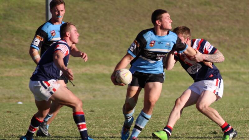 DYNAMIC DUO: Jake Clarke and Dean Scott (with ball) are the Moruya Sharks’ two representative players selected in the Greater Southern Region Stars team. 