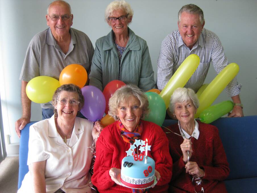THE 1935 CLUB: Six Eden residents have celebrated their 80th birthdays with a photo at the Magnet and a birthday cake. (Back) John Perry, Sheila Jones, John Fletcher and (front) Shirley McDonald, Shirley Brown and Valda Edwards. 