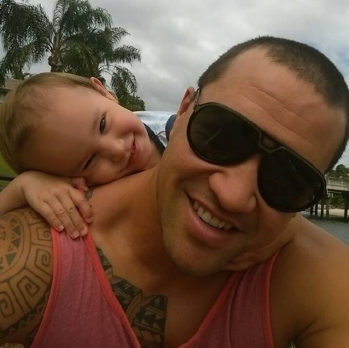 Marcus Shearer, with his son Tane, before the accident in December last year. 