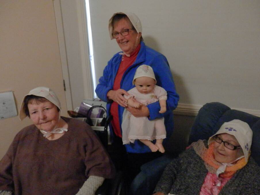 Imlay House volunteer Susan Stephenson with residents Bernie Alcock and Gladys Morgon. 