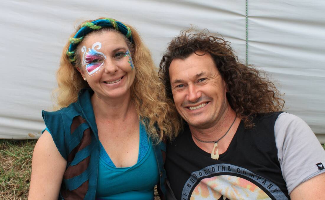 Good times: Nicole Migotto-Brown and Karl Brown of Mallacoota enjoy the bands, street buskers, dancing and fire twirling at the Cobargo Folk Festival on the weekend.