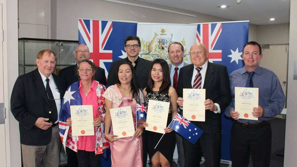 (Back row, from left) Mayor Michael Britten with Lawrence Verney, Tamer Ahmed, Member for Eden Monaro Peter Hendy, Chris Smeda, Wayne Armstrong and (front) Pauline Rees, Sommai Harris and Supichaiya Luanmongkol at a citizenship ceremony in Bega. 