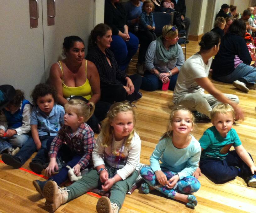 Hot potato: Eden Playgroup kids wait patiently to see the Wiggles, which they attended for free thanks to a grant from Campbell Page. 