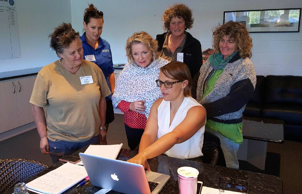 New Skills: Kat Smith showing business owners some tips on how to use Facebook for business at a recent Sapphire Coast Business Women meeting. Picture: Julie Novotny