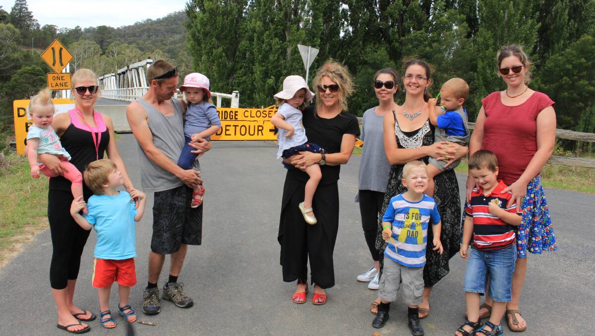 Rocky Hall Preschool director Jodie Dickinson with parents and children affected by the New Buildings bridge closure.