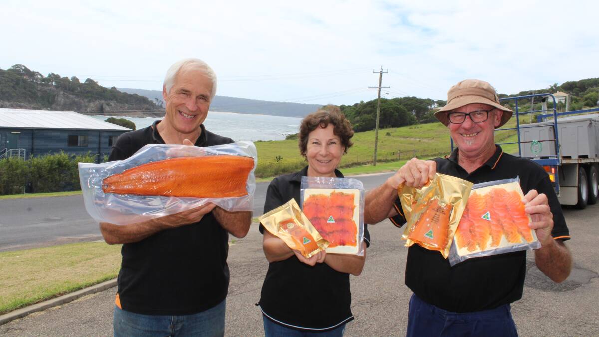 Champions: The Eden Smokehouse team Stan Soroka, Michelle Beattie and Garry Corbett holding up their three gold medal winning products. Picture: Melanie Leach