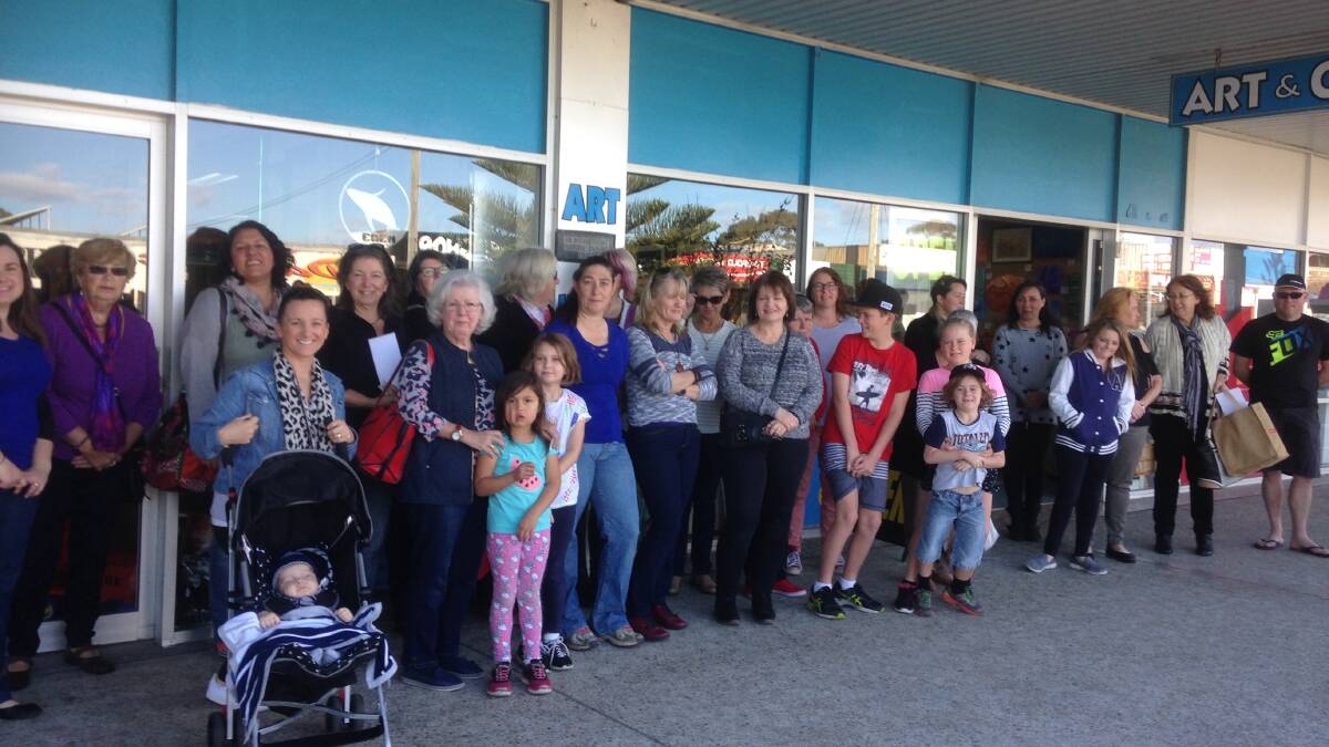 Shop Local: The large crowd of locals enjoy a fun morning out exploring Art on Imlay as part of Eden's monthly Cash Mob on Saturday. 