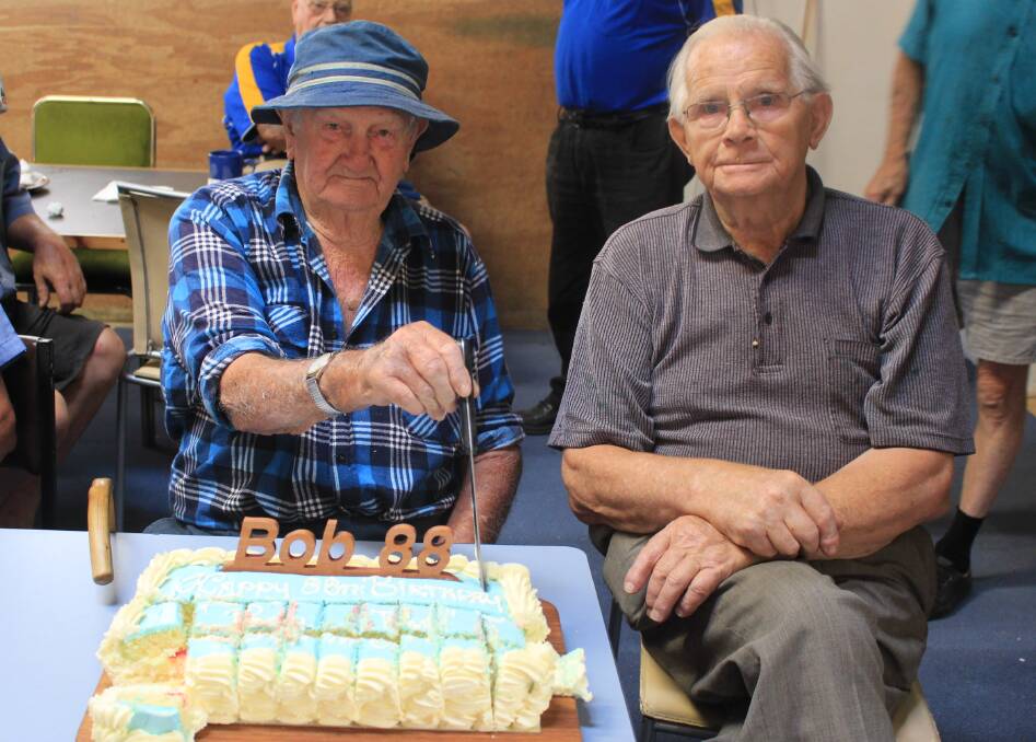 Rivals unite: Good friends Bob Walder of England and Jim Gall of Scotland celebrated their 88th birthdays at the Eden Men's Shed on Friday.