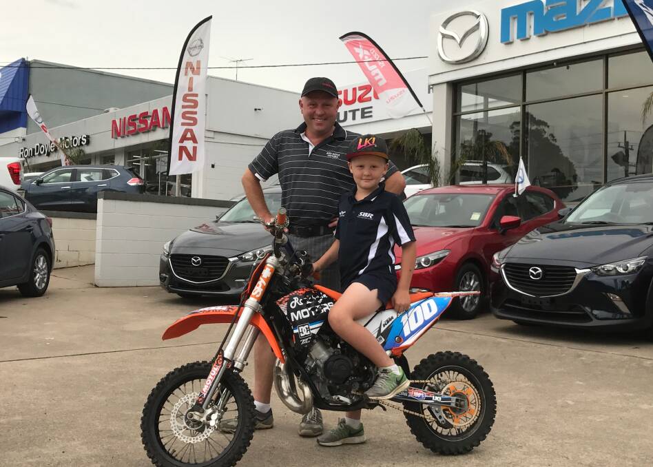 Pambula Public School student Kye Smith thanks Troy Altman from Ron Doyle Motors for all his support and sponsorship throughout 2016. 