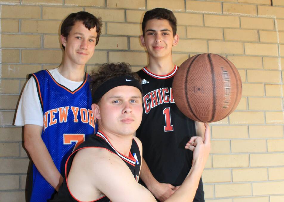 PBL: Dressed as basketball players, Year 9's Luke Albanese and Connor Kellalea and Year 10 student and expert ball spinner Tristan Harpin. 
