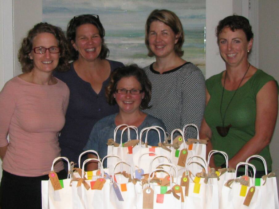 Members of the Far South Coast Maternity Advisory Group came together in Pambula to assemble pregnancy loss packs to donate to the South East Regional Hospital. 