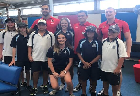  Eden Marine High students are buzzing with excitement at meeting three members of the St George Illawarra Dragons Josh Kerr, Drew Hutchison and Jason Gillard.
