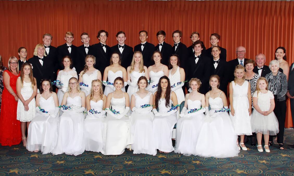 Sparkling night: Lumen Christi Year 11 students celebrate their big night at the Legacy Debutante Ball on Saturday, May 27. More pictures page 15. 