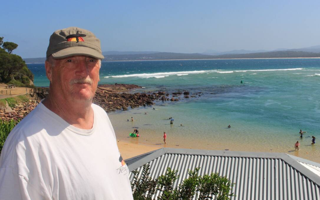Beware: Merimbula surfer John Chapman warns people of the dangers of swimming at Bar Beach where he says tidal currents can cause a very strong rip. 