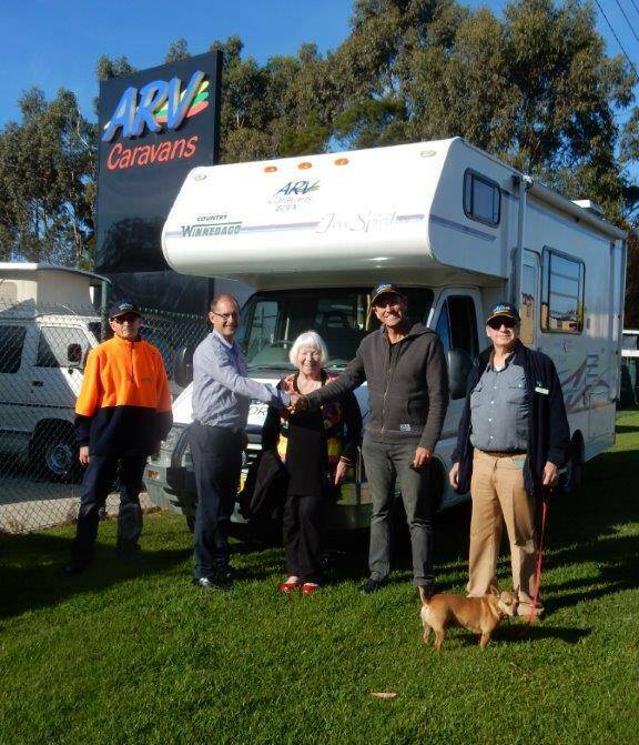 New Home: Dane and his crew were all smiles when they picked up the motorhome from ARV Caravans in Eden. The vehicle will become Dane's new home during his 4000km journey. 