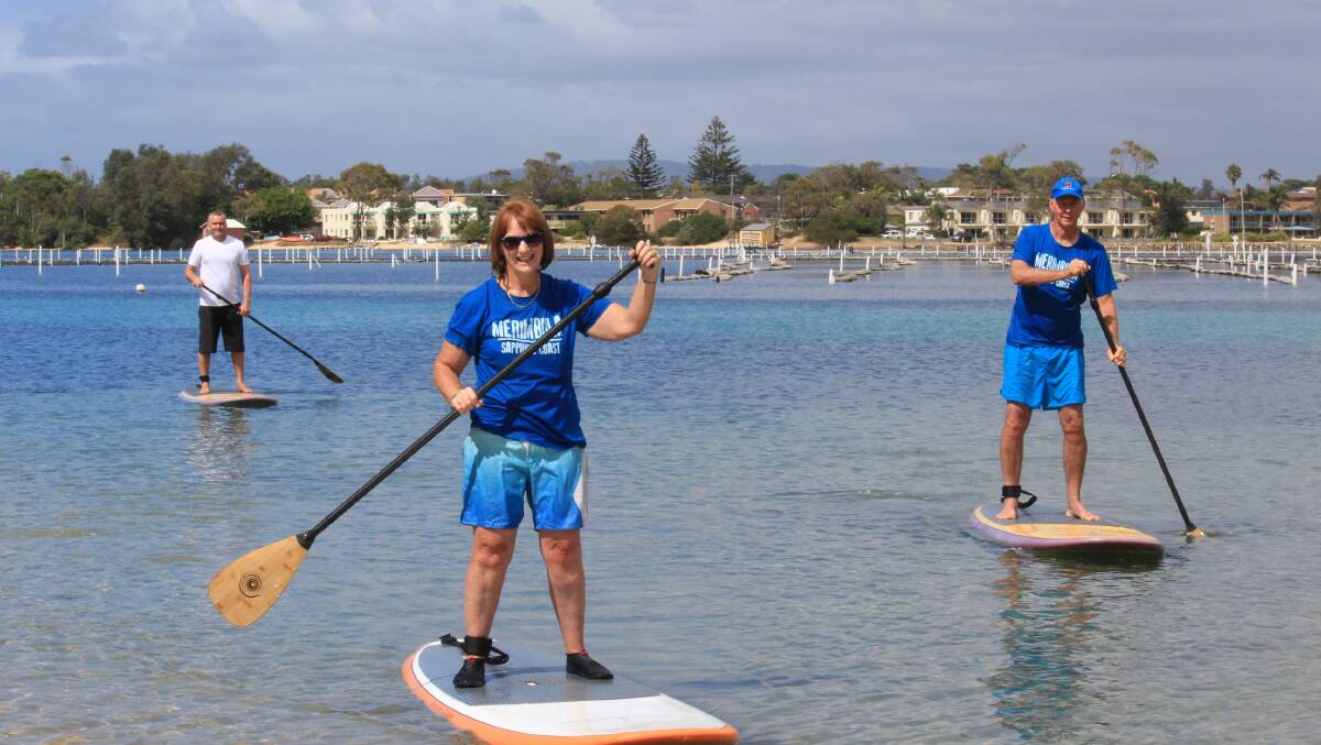 Young at heart: Liz Smallwood and Steve Goodchild try their hand at Stand Up Paddleboarding ahead of Saturday's Seniors on SUPs event. 
